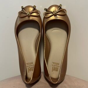 Mini Melissa stunning new gold ballerina flats.